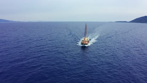 4K-Drone-footage-–-Flying-around-sailing-yacht-on-the-move-on-Aegean-sea,-Datça,-Turkey