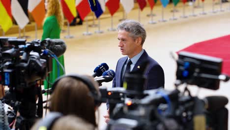 Slovenian-Prime-Minister-Robert-Golob-talking-to-the-press-during-the-European-Council-summit-in-Brussels,-Belgium