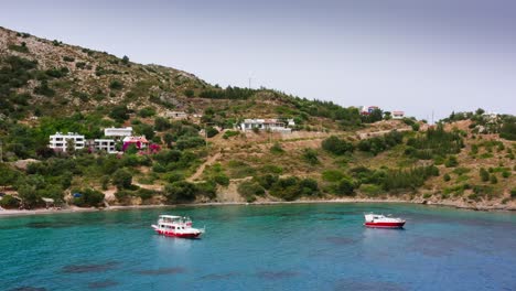 Boats-in-the-lagoon-of-mountainous-coastline-at-Datça-peninsula,-Kargı-village