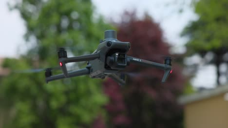 Detail-view-of-flying-DJI-Mavic-3E-enterprise-drone-for-photogrammetry