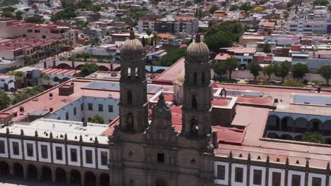 Basilica-of-Our-Lady-of-Zapopan,-Guadalajara,-Mexico,-orbiting-drone-footage