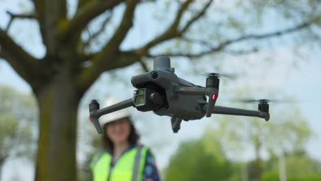 Close-up-view-of-flying-Mavic-3E-small-professional-enterprise-drone-for-photogrammetry