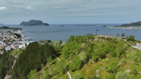 Tourists-on-top-of-mountain-Aksla-in-Alesund-Norway-with-North-sea-and-Atlantic-ocean-background---Aerial
