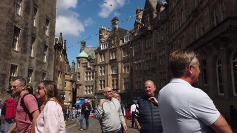 People-start-to-gather-at-the-Royal-Mile-for-the-arrival-of-King-Charles-III-in-Edinburgh