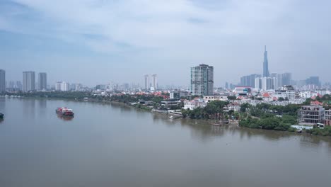 Hyperlapse-of-container-and-leisure-boats-on-Saigon-river-from-aerial-view-on-sunny-day