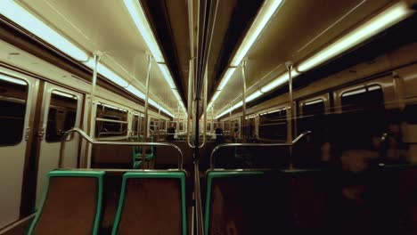 Interior-of-metro-public-transportation-arriving-at-next-station-underground