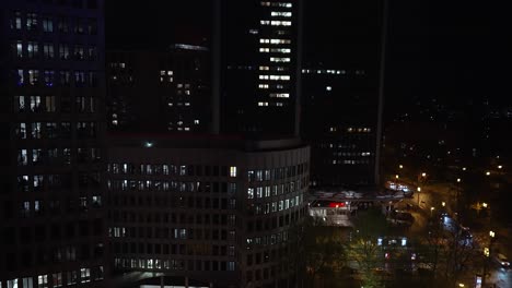 Night-Time-View-Overlooking-Office-Buildings-Beside-Ludwig-Erhard-Anlage-Park-In-Frankfurt,-Germany