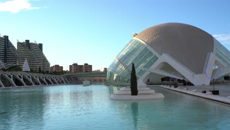 Wide-shot-of-pool-and-futuristic-architecture-named-City-of-Arts-and-Sciences-in-Valencia