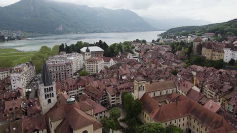 City-Towers-and-Buildings-of-Annecy,-France---Aerial-Drone-Landscape