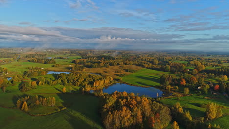 A-drone-aerial-over-a-paradise-of-ponds-and-forest-greens