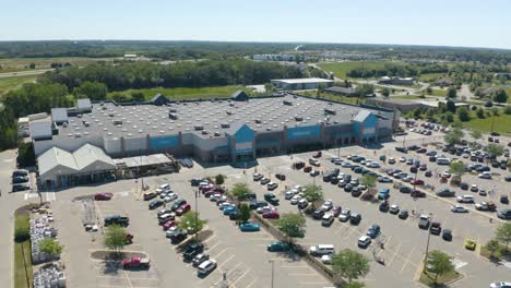 Cinematic-Aerial-Shot-Above-Walmart-Supercenter-in-Typical-United-States-Town