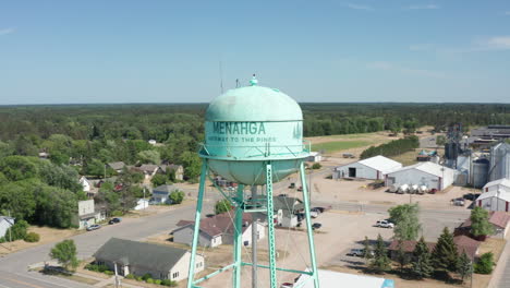 Aerial-View-of-the-Iconic-Water-Tower-in-Downtown-Menahga,-Minnesota