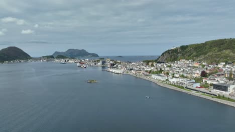 Shoreline-and-city-center-of-Alesund-Norway---Summer-aerial-with-North-Atlantic-Ocean-in-background