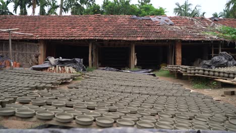 Various-items-made-of-clay-are-left-to-dry-in-the-sun