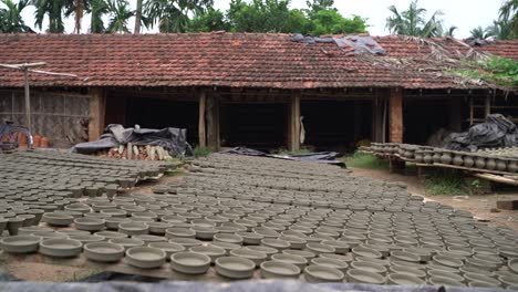 Various-items-made-of-clay-are-left-to-dry-in-the-sun