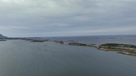 The-Atlantic-Ocean-Road-full-panoramic-aerial-view-with-ocean-and-horizon-in-background---Summer-cloudy-evening-aerial