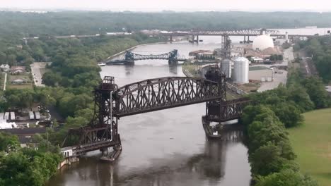 Bridges-in-Joliet,-Illinois-along-the-Des-Plaines-River-with-drone-video-moving-forward-parallax