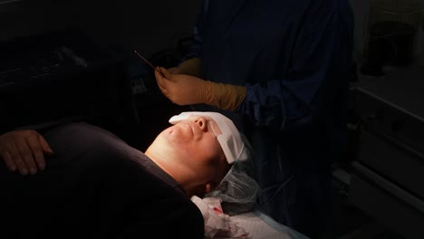 jowl-liposuction,-surgery-in-operating-room,-doctor-operating-on-face,-obesity-operation,-cosmetic-surgery,-removal-of-fat-cells