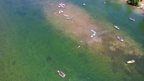 Aerial-footage-of-people-swimming-at-Jessica-Hollis-Park-in-Austin