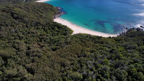 Boat-Beach---Seal-Rocks---Mid-North-Coast---New-South-Wales--NSW---Australia---Aerial-Shot-Over-Mountains-Reveal