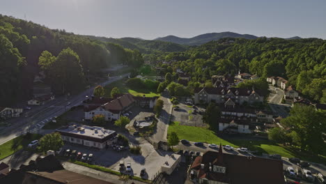 Helen-Georgia-Aerial-v6-low-flyover-charming-town-with-traditional-Bavarian-style-architectures-capturing-picturesque-mountain-townscape-and-nature-landscape---Shot-with-Mavic-3-Cine---October-2022