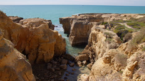 Nature-Scenic-Of-Rocky-Coastal-Cliffs-At-The-Beach-In-Algarve,-Portugal