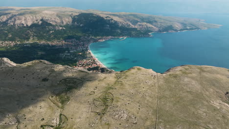 Aerial-View-of-Baska-Town-and-Krk-Island-Coastline-In-Croatia