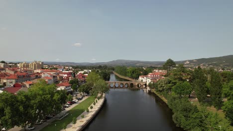 Aerial-View-of-River-Tâmega-and-Roman-Bridge-of-Trajano-in-Chaves,-Portugal