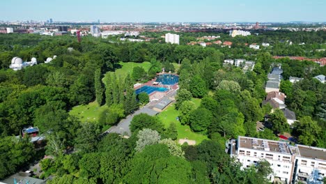 Gorgeous-aerial-top-view-flight-public-swimming-pool-Insulaner,-city-berlin-Germany-Summer-day-2023