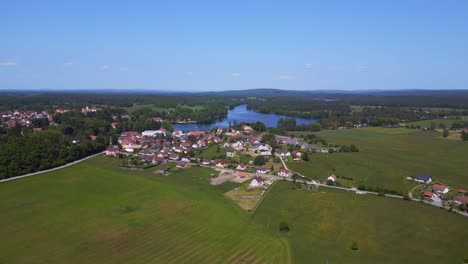 Unbelievable-aerial-top-view-flight-Summer-field-at-lake-village-Chlum,-Czech-Republic-2023