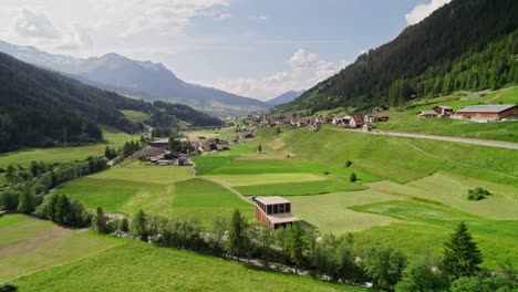 Cadras-in-Switzerland,-aerial-drone-flight-on-a-beautiful-summer-day