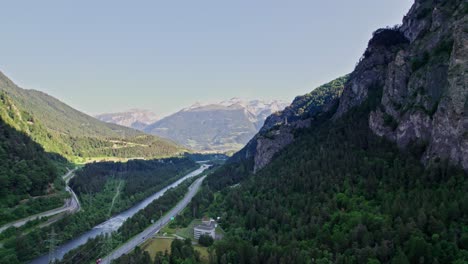 Aerial-View-Of-Valley-In-Rothenbrunnen-With-Hinterrhein-River-Running-Through-It