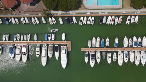 Revealing-drone-shot-of-a-harbor-in-Cortellazzo,-Italy