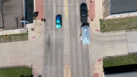 Intersection-in-downtown-Moline,-Illinois-with-drone-video-overhead-looking-down-and-stable
