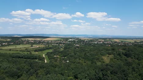 Hungarian-village,-Nagyoroszi-with-drone's-point-of-view-on-a-sunny-summer-day