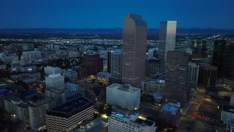 Aerial-establishing-shot-of-Denver,-Colorado-skyline-at-dawn