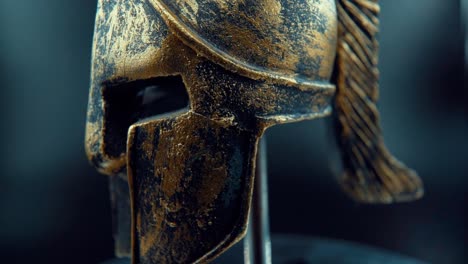 A-close-up-macro-cinematic-shot-of-a-spartan-design,-warrior-metal-bronze-helmet,-on-a-360-rotating-stand,-studio-lighting,-Full-HD-video,-Super-Slow-Motion-120-fps