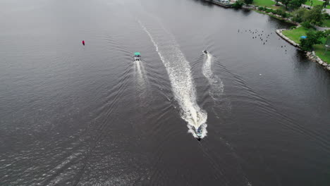 Aerial-video-of-3-boats-passing-each-other-in-the-Providence-River-in-Providence,-RI