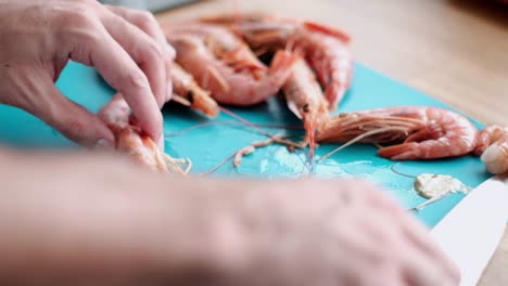 Chef-Peeling-and-Preparing-Argentinean-Shrimp-Prawn--4K-Footage