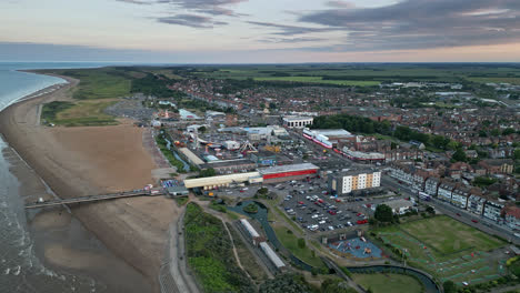 Aerial-view-of-Skegness,-a-town-that's-sure-to-surprise-you-with-its-charm-and-beauty,-from-the-beach-to-the-campsites