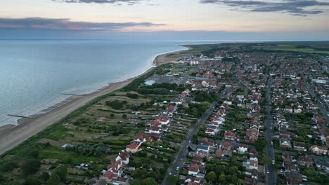 A-summer-holiday-destination-that's-perfect-for-couples,-families,-and-solo-travelers-alike-is-captured-in-a-sunset-scene-over-Skegness