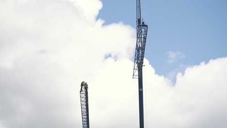 10-July-2023,-Riga,-Latvia:-Workers-Seting-Up-Crane-in-Big-Hight