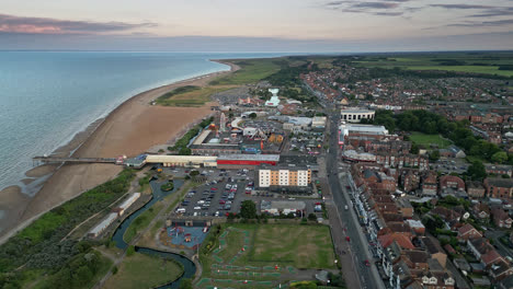 A-seaside-resort-with-something-for-everyone,-from-adrenaline-pumping-activities-to-relaxing-days-by-the-sea,-is-seen-from-above-in-Skegness