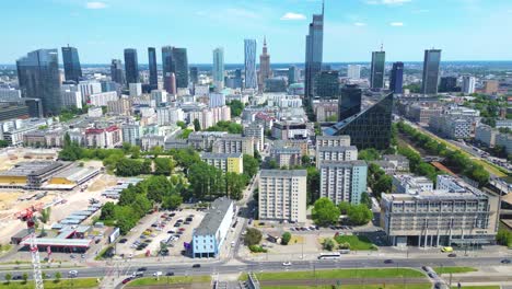 Aerial-panorama-of-Warsaw,-Poland-over-the-Vistual-river-and-City-center-in-a-distance