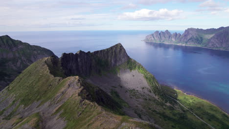 Beautiful-Aerial-View-of-the-Island-Senja-in-Northern-Norway,-Stunning-Fjord-and-Mountain-Landscape
