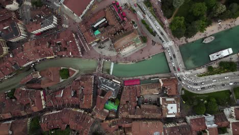 City-Buildings-of-Old-Town-Annecy,-Establishing-Aerial-Top-Down-View
