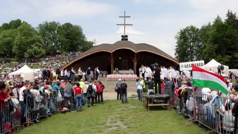 Media-people-filming-ceremony-at-Csiksomlyo-Pilgrimage,-celebrating-Pentecost