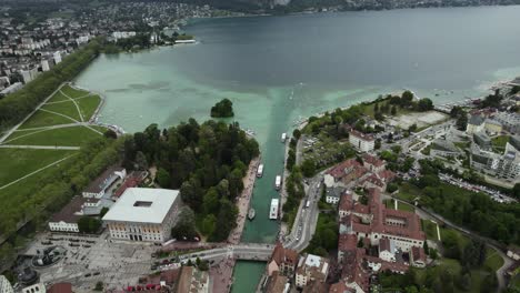 Canal-River-leading-into-Lake-Annecy,-Aerial-Drone-View-of-Old-Town