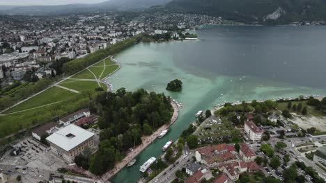 Aerial-Landscape-of-Old-Town-City-Buildings-by-Lake-Annecy,-France