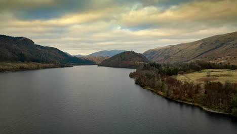 Delight-in-the-beauty-of-the-Cumbrian-landscape-with-an-enchanting-aerial-video,-featuring-Thirlmere-Lake-and-its-majestic-mountainous-surroundings